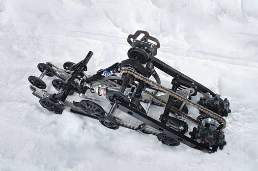 The Rear Axle Drive's unique design maintains the tension of the snowmobile's track even when the terrain gets rough.