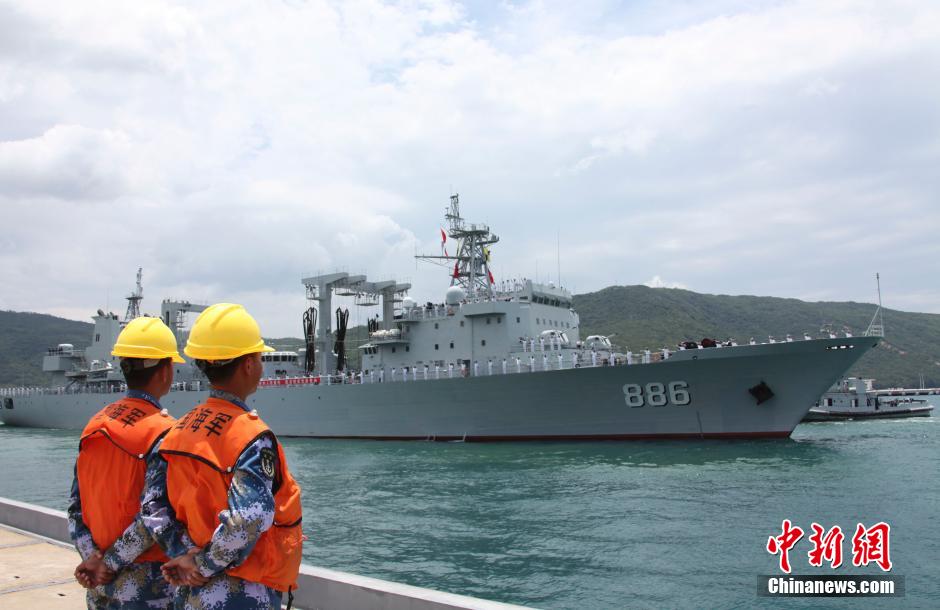 The Qiandaohu replenishment ship, hull number 886, is seen leaving Hainan to accompany other PLAN ships to RIMPAC 2014, where it will refuel and resupply them on the roundtrip to Hawaii.