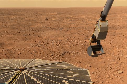 This image shows the Lander's solar panel and the Robotic Arm with a sample in the scoop. It was taken by the Surface Stereo Imager looking west on the 16th Martian day (sol 16) after landing.