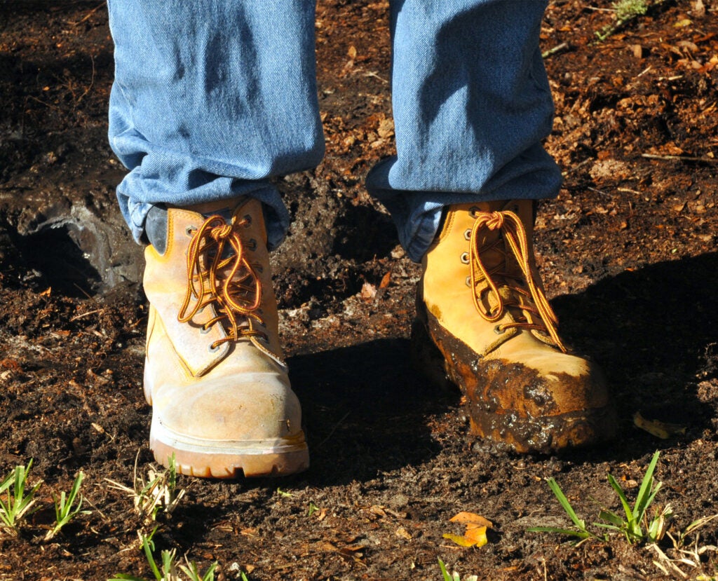 The work boot on the left was treated with Ever Dry; the boot on the right was not.