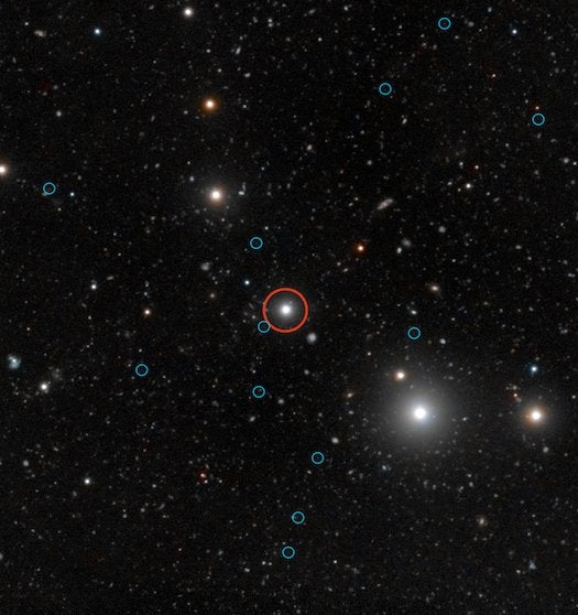 For the first time, astronomers have been able to get a better look at starless "dark galaxies," theorized to exist but never directly seen. Even now, it takes some annotation in this image. The quasar lighting them up is circled in red; the dark galaxies are circled in blue. Read the whole story <a href="https://www.popsci.com/science/article/2012-07/telescope-spots-once-invisible-starless-galaxies-early-universe/">here</a>.