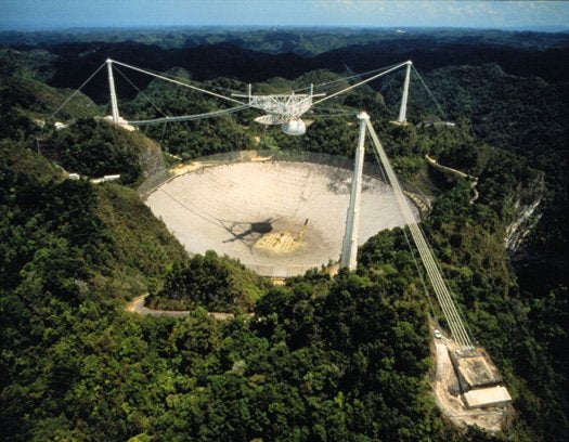 The biggest telescope dish right now is at the Arecibo Observatory of Puerto Rico. This dish took three years to build (1960-1963) and, clocking in at about 20 acres in size, has enjoyed a 50-year reign as the largest telescope dish. The gaping depth of the bowl makes the dish much more sensitive, so scientists using the telescope can collect as much data in minutes as smaller telescopes could in hours.