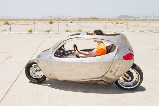 This weird little two-wheeled...car? Is it a car? Anyway, it's the C1 prototype from Lit Motors, a fully electric, enclosed vehicle equipped with a pair of super-powerful gyros to keep it upright. Read more at <a href="http://www.wired.com/autopia/2012/05/lit-motors-c1/">Wired</a>.