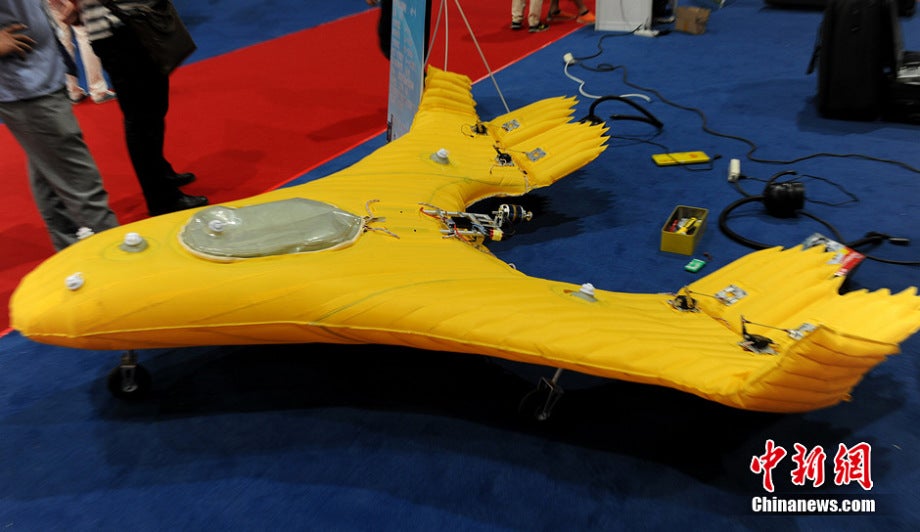 Shown here is a fully inflatable UAV, designed as a flying wing. The electric motor in mounted on the center rear, the actuators for the wing flaps on the side can also be seen.