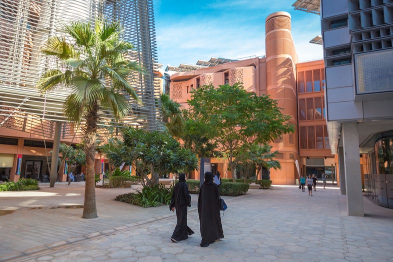 Is Masdar City a ghost town or a green lab?