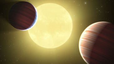 Two Planets Discovered Sharing the Same Orbit