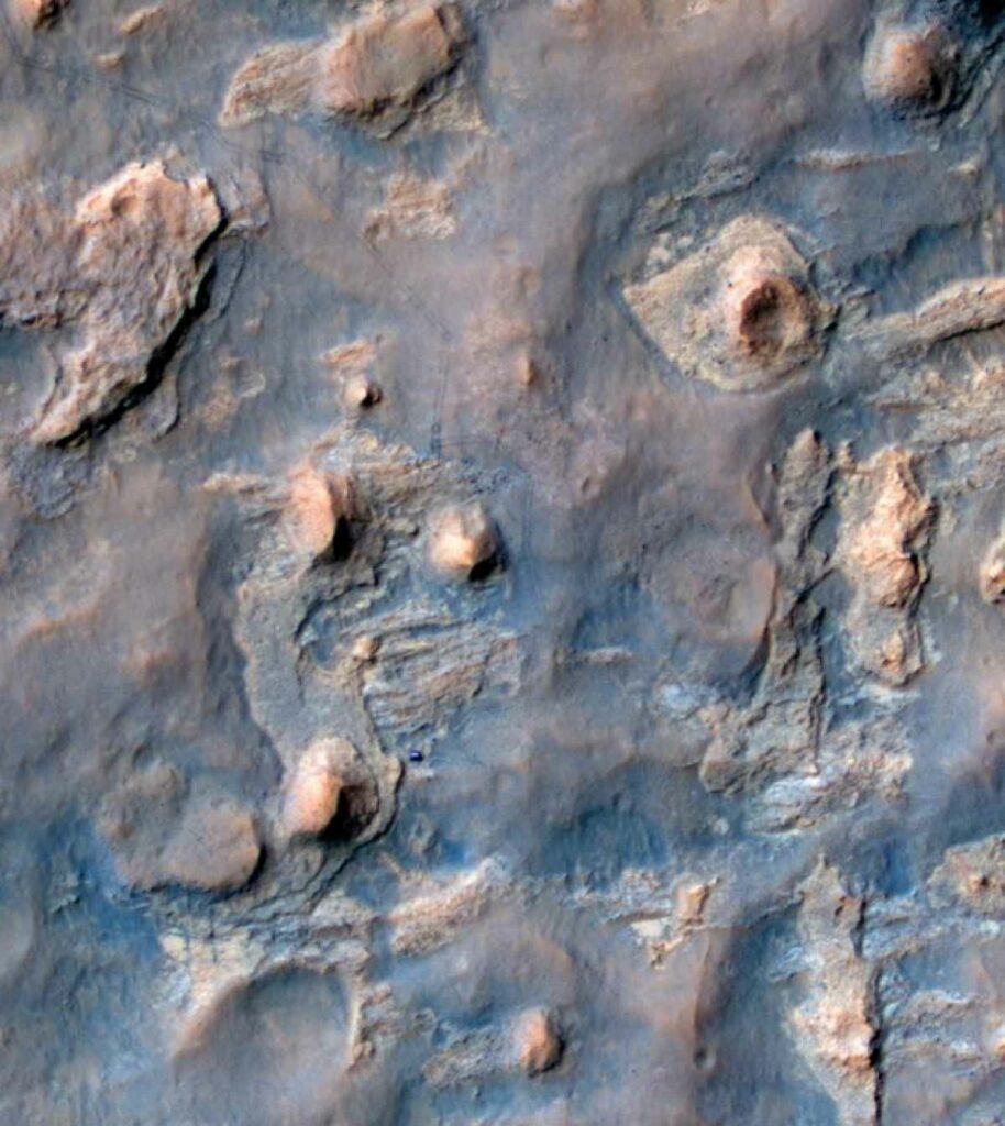 NASA's Mars Reconnaissance Orbiter caught this photo of Curiosity's tracks on Mars. Good work, little friend. <em>From April 18, 2014</em>