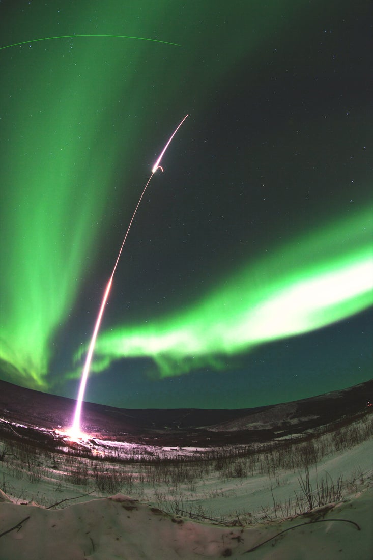 Pretty Space Pics: A Rocket Arcs Across the Northern Lights