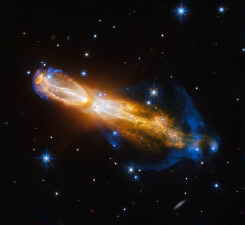 The Calabash Nebula, pictured here — which has the technical name OH 231.8+04.2 — is a spectacular example of the death of a low-mass star like the Sun. This image taken by the NASA/ESA Hubble Space Telescope shows the star going through a rapid transformation from a red giant to a planetary nebula, during which it blows its outer layers of gas and dust out into the surrounding space. The recently ejected material is spat out in opposite directions with immense speed — the gas shown in yellow is moving close to a million kilometres an hour. Astronomers rarely capture a star in this phase of its evolution because it occurs within the blink of an eye — in astronomical terms. Over the next thousand years the nebula is expected to evolve into a fully fledged planetary nebula. The nebula is also known as the Rotten Egg Nebula because it contains a lot of sulphur, an element that, when combined with other elements, smells like a rotten egg — but luckily, it resides over 5000 light-years away in the constellation of Puppis (The Poop deck).