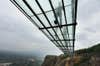 The world's <a href="http://www.theverge.com/2015/9/29/9413571/china-biggest-glass-suspension-bridge">longest glass suspension bridge</a> opened in the Shiniuzhai National Park in China.  The bridge spans 984 feet, but all that stands between travelers and the 590 foot drop is an inch of glass.  And a solid steel supporting structure, just in case.