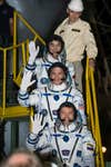 Kononenko, Lindgren, and Yui wave goodbye as they board the Soyuz TMA-17M spacecraft for launch at the Baikonur Cosmodrome in Kazakhstan on Wednesday, July 22 EDT before they spend the next five months at the International Space Station.