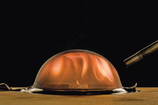 A fine-mesh kitchen sieve with a candle inside simulates a Davy miner's safety lamp. An explosive mixture of propane gas and air is blown in from the outside. If the mesh is fine enough, the fire will stop at the screen even as the explosive gas flows through it.