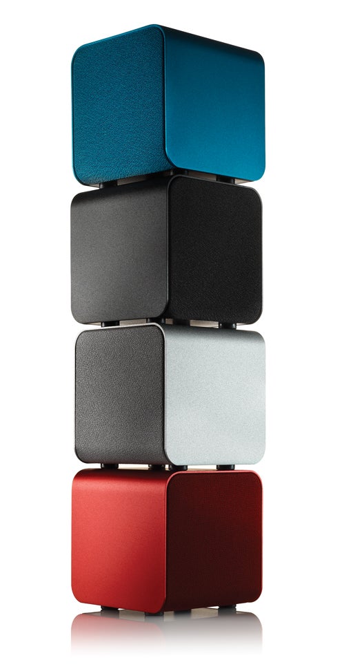 Four Stacked NuForce Cube portable speakers