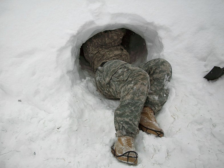 Soldier Making Snow Cave In Alaska