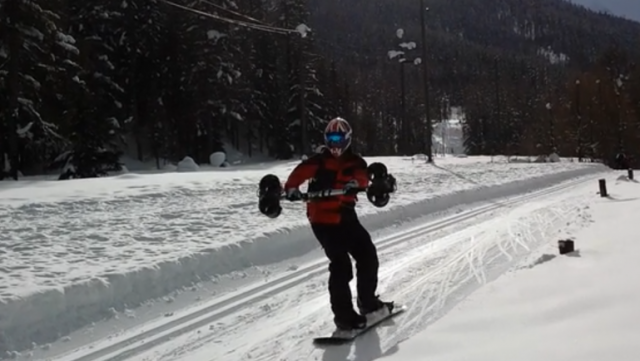 Snowboarder Glides With Handheld Airplane Thrusters