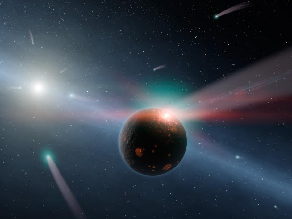 This artist's concept illustrates a storm of comets around a star near our own, called Eta Corvi. Evidence for this barrage comes from NASA's Spitzer Space Telescope, whose infrared detectors picked up indications that one or more comets was recently torn to shreds after colliding with a rocky body.