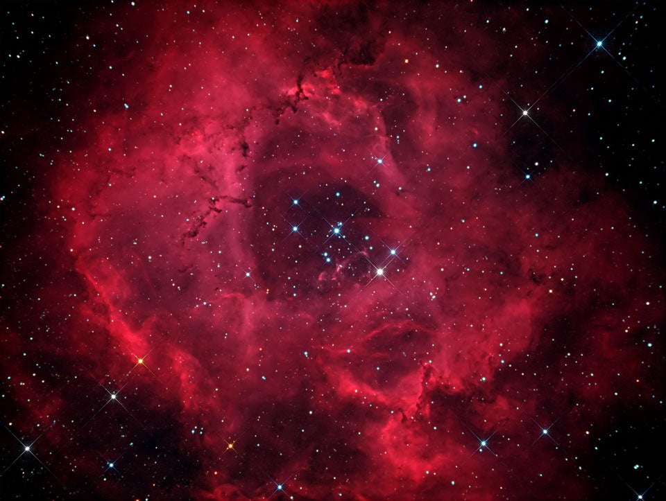 The Rosette Nebula, chosen as NASA's Astronomy Picture of the Day earlier this week, is the perfect Valentine's Day space object, because it's pretty and it sort of looks like a rose. Read more at <a href="http://apod.nasa.gov/apod/ap120214.html">NASA's site</a>.