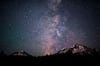 "The Milky Way setting behind the Three Sisters and with a lone Persied meteor."