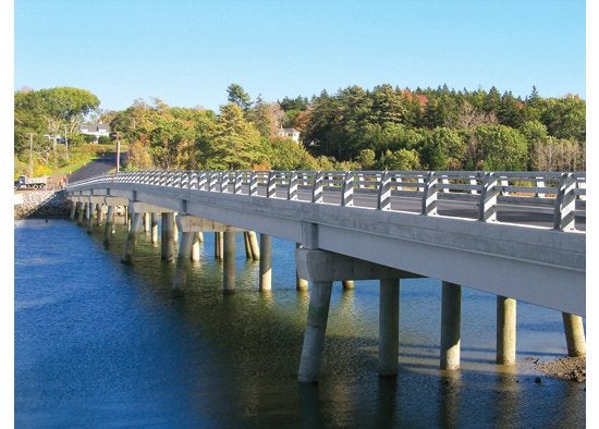 The 540-foot Knickerbocker Bridge in Boothbay, Maine, is the longest fiber-reinforced bridge ever constructed. Its lightweight hybrid-composite beams, designed by John Hillman of the HC Bridge Company and built by Harbor Technologies, are made of a corrosion-resistant fiber-reinforced polymer shell filled with reinforced concrete. The shell is one third the weight of steel and one tenth the weight of concrete, allowing for quicker construction (it takes just one backhoe to place the beams), and each beam lasts 100 years longer than ordinary concrete and steel, at a similar cost. <em>Jump to the beginning of the <a href="https://www.popsci.com/?image=29">Engineering</a> section.</em> <strong>Jump to another Best of What's New category:</strong>