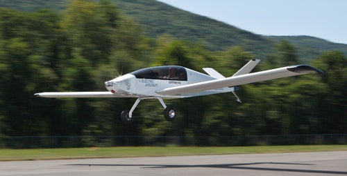 A fully electric airplane, the ElectraFlyer-C, landing on a runway