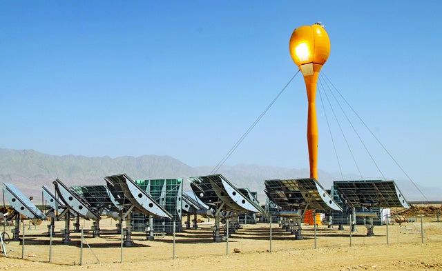 Mirrors direct sunlight onto the solar plant's tower, heating air to run a turbine that powers 70 nearby homes.