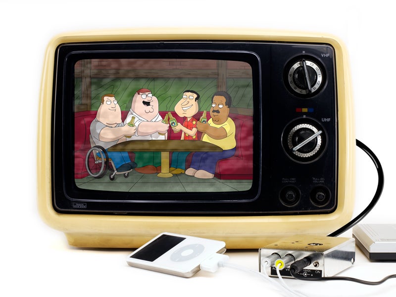 A vintage TV with an iPod connected to it and Family Guy playing on the TV screen.