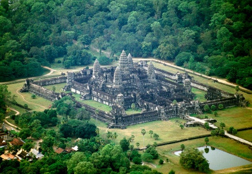While archaeology in Egypt is stymied by population, uncovering Angkor is a challenge due to dense forests and landmines. Although the temple of Angkor Wat draws more than two million tourists a year, the surrounding ruins hold untouched archaeological treasure.