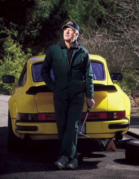 Wilkinson (here, in his driveway) spent more than two years on his frame-off rebuild of the Porsche 911SC. He also spent $70,000--far more than the car is worth.