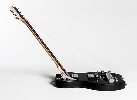 Nothing ruins your hardcore-rocker image faster than tripping over your ax as you attempt to maneuver through a tight space. The world's first folding electric guitar has a pair of high-end pickups, a Tune-o-Matic bridge, and strings that roll into the body when the neck is doubled over so that it's ready to play whenever you are. <strong>Centerfold $3,370; <a href="http://fredzon.com">fredzon.com</a></strong>