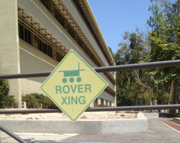 This sign sits outside the JPL facility housing a full-scale Curiosity twin, which engineers will use for tests and checkouts.
