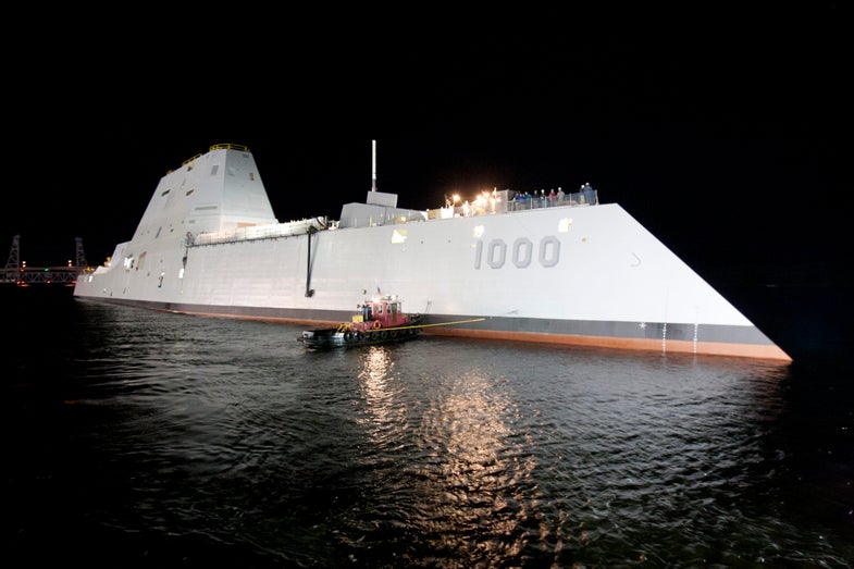 131028-O-ZZ999-103 BATH, Maine (Oct. 28, 2013) The Zumwalt-class guided-missile destroyer DDG 1000 is floated out of dry dock at the General Dynamics Bath Iron Works shipyard. The ship, the first of three Zumwalt-class destroyers, will provide independent forward presence and deterrence, support special operations forces and operate as part of joint and combined expeditionary forces. The lead ship and class are named in honor of former Chief of Naval Operations Adm. Elmo R. "Bud" Zumwalt Jr., who served as chief of naval operations from 1970-1974. (U.S. Navy photo courtesy of General Dynamics/Released)