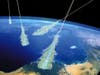 This is an artist's conception showing cosmic rays hitting the Earth. When they reach the Earth's atmosphere, the rays trigger showers of particles called air showers. In this illustration, the air showers are the branching, broom-tail portion of the rays.