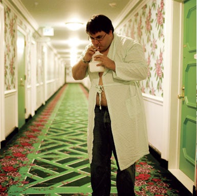 The author downs a jug of contrast agent for a CT scan at the Greenbrier Resort´s world-renowned health clinic.