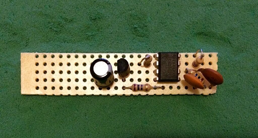 Add resistors, capacitors, and amplifier