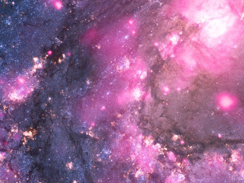 In this pretty pink spacepic, a black hole's explosion of energy has actually provided evidence of a population of stellar black holes. Read more over at <a href="http://www.nasa.gov/multimedia/imagegallery/iotd.html">NASA</a>.