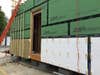 exterior insulation fit over flood proof sheathing and blocks