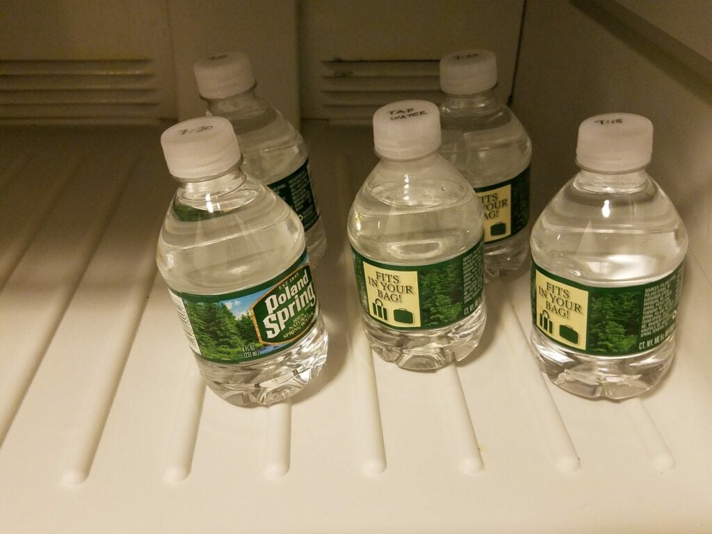 Unfrozen water bottles freezer