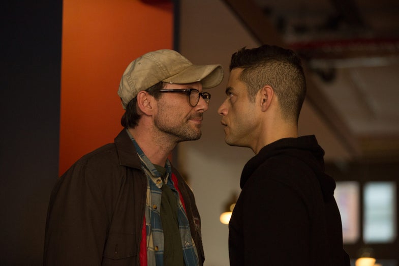 Mr. Robot (Christian Slater) faces hacker Elliot Alderson (Rami Malek) in the season one finale of 'Mr. Robot'