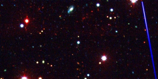 Ancient, Massive Galaxy Cluster Harbors 800 Trillion Suns