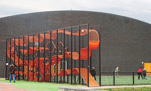 What happens to a jungle gym when it's compressed? It turns into a maze, a fortress, a rock-climbing wall or a soccer goal. Sixty children can comfortably fit in and on Wall-holla, a structure 16 feet tall and 52 feet long.