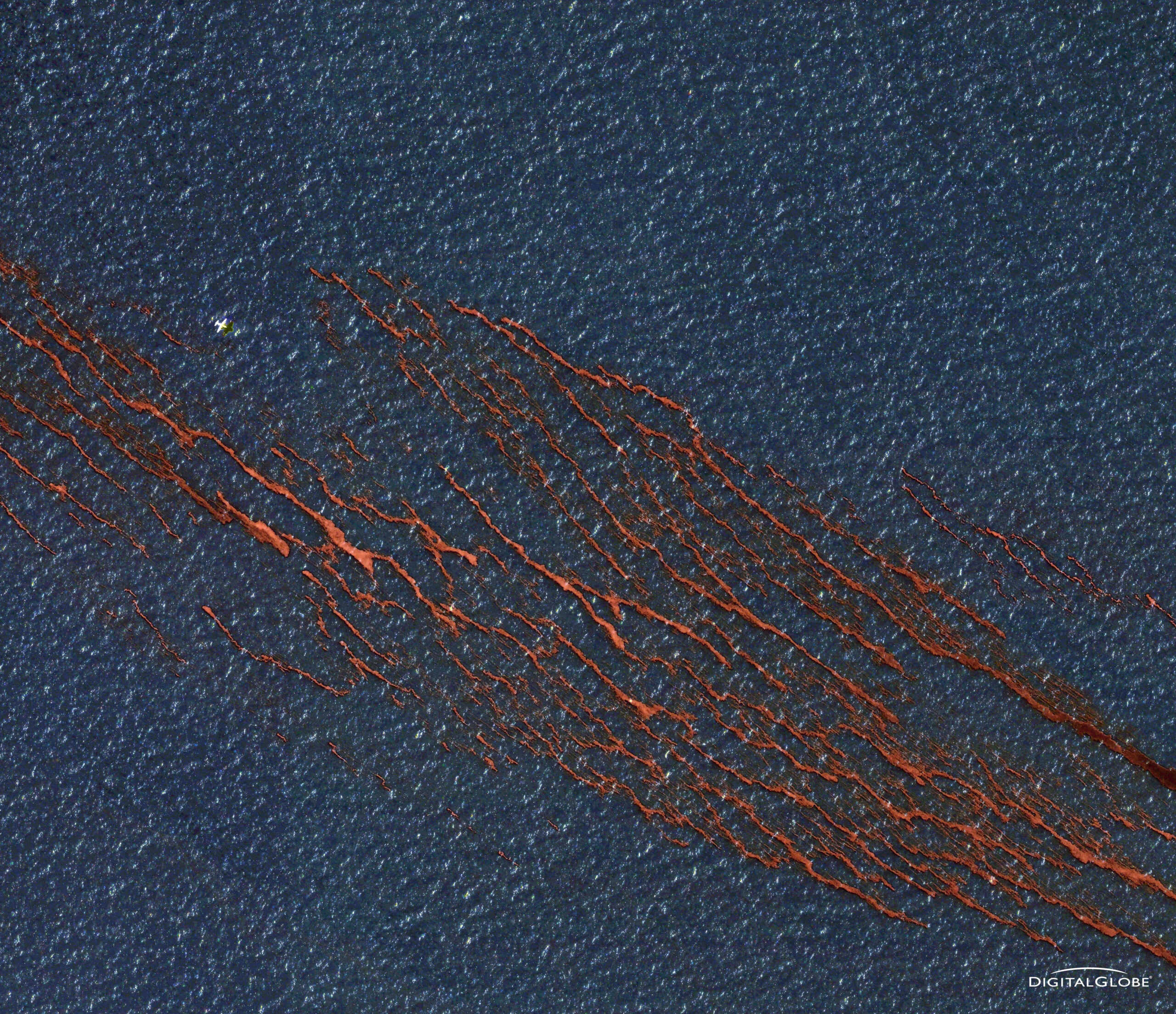 Transocean Deepwater Horizon Drilling Oil Slick, Gulf of Mexico, USA-April 26, 2010: This is a satellite image of the oil spilled and associated clean up caused after an explosion at the Transocean Deepwater Horizon Drilling Slick in the Gulf of Mexico. (credit: DigitalGlobe)