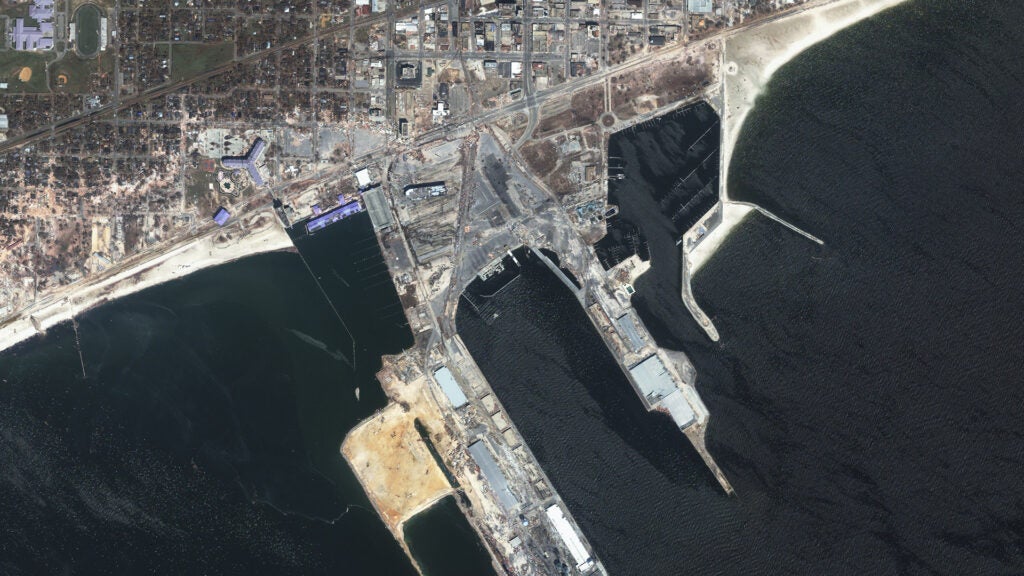 GeoEye broke its own rule and included two images from 2005 because of this photo. This is Gulfport, Miss., on Sept. 2, 2005, in the first days after Hurricane Katrina ravaged the Gulf Coast. Devastated piers and beachfront businesses are clearly visible.