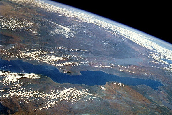 The world's longest and second-deepest freshwater lake, formed nearly 25 million years ago as part of the Great Rift Valley. It's spread across four countries, with most of it shared between Tanzania and the Democratic Republic of the Congo.