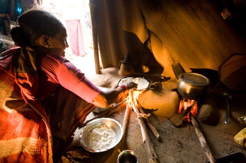 The Clean Cookstove is meant to replace traditional open fires, such as those above, which burn fuel incompletely--producing dangerous indoor air pollution.