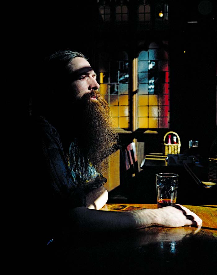 De Grey, who fuels his speculations with a diet of beer and junk food, imbibes a pint at his local tavern, the Eagle Pub in Cambridge, England.