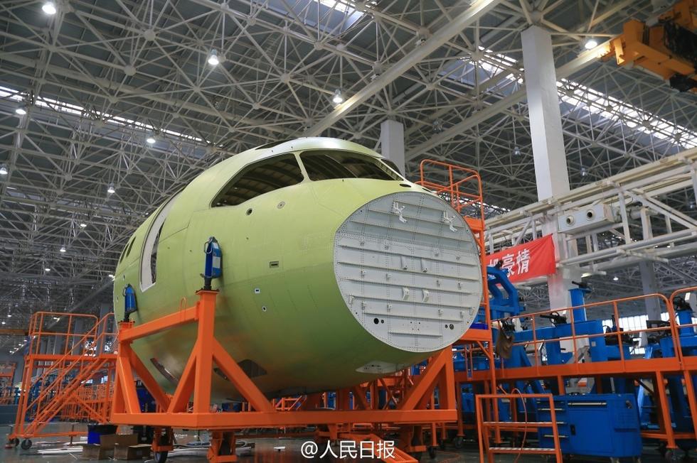 The C919's forward fuselage, which will hold the cockpit and radome nose, has been completed at Chengdu. It will be shipped to Shanghai where it will be mated with the rest of the fuselage and wings to complete the first C919 jetliner prototype by December 2014.