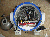 An R2-D2 cooler with video game console circuit boards inside. Top-down view.