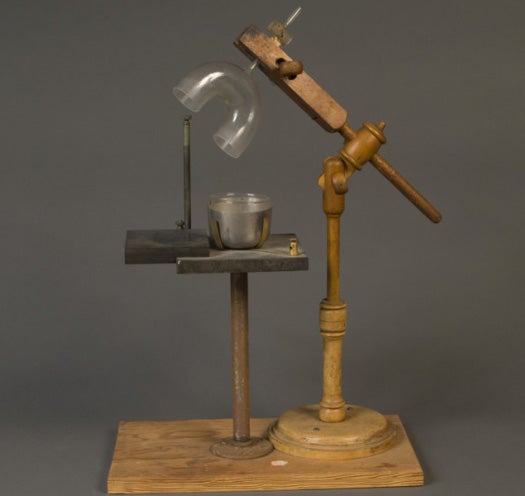 More than a century ago, NIST utilized this coulometer, or voltameter, to measure the amount of electricity present in a given material. The platinum bowl served as the cathode, which connected to an anode in a separate flask via a siphon containing an electrolyte.