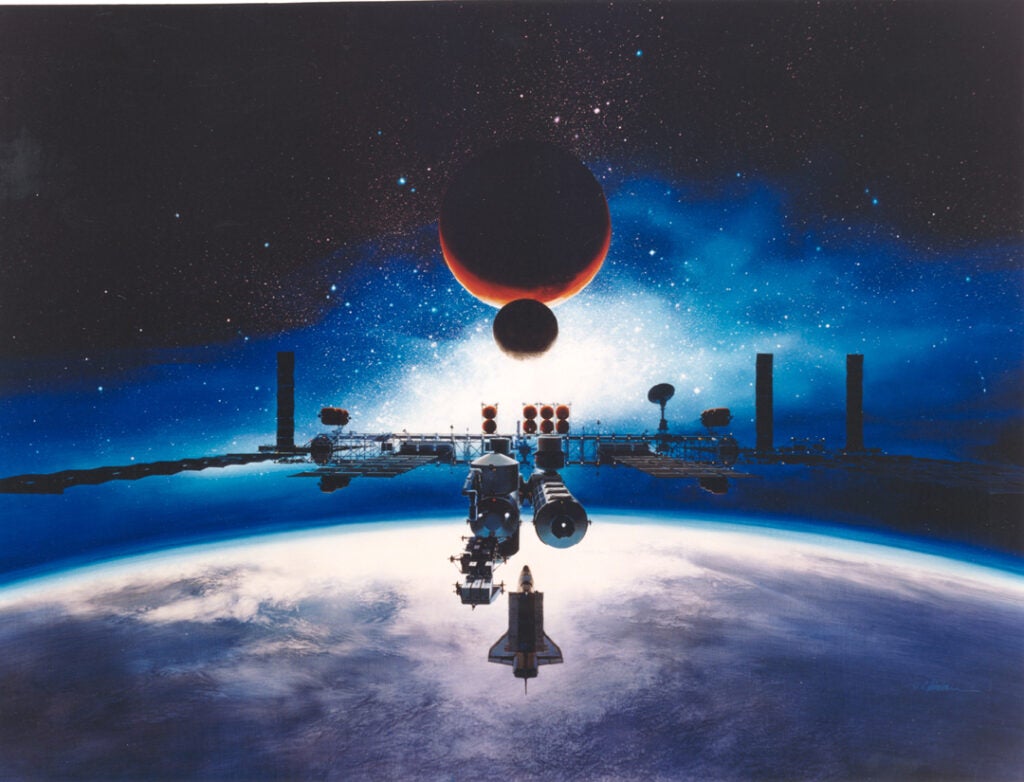 Another artist's concept of space station Freedom in orbit with an overly large Moon and Mars in the background.