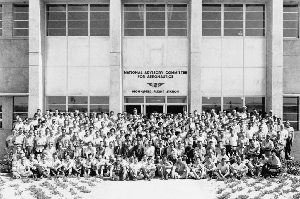 The whole staff of the High Speed Flight Station in 1954, in front of the new building erected after the site became a full laboratory in its own right.